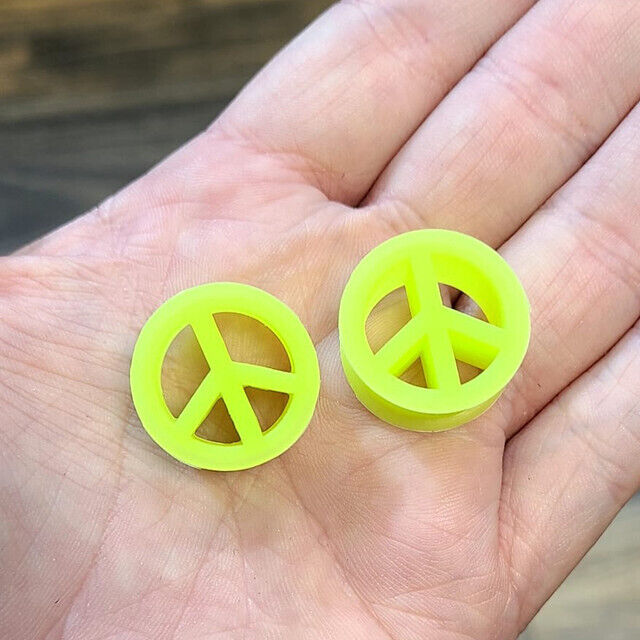 Pair of UV Glow Silicone Peace Sign Ear Plugs Tunnels Gauges