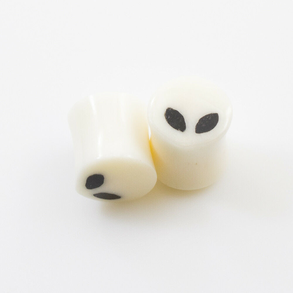 Pair of Ear Plugs made of Organic Horn Bone with Alien Design