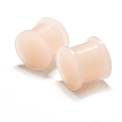 Pair of Flesh Tone Ear Plugs