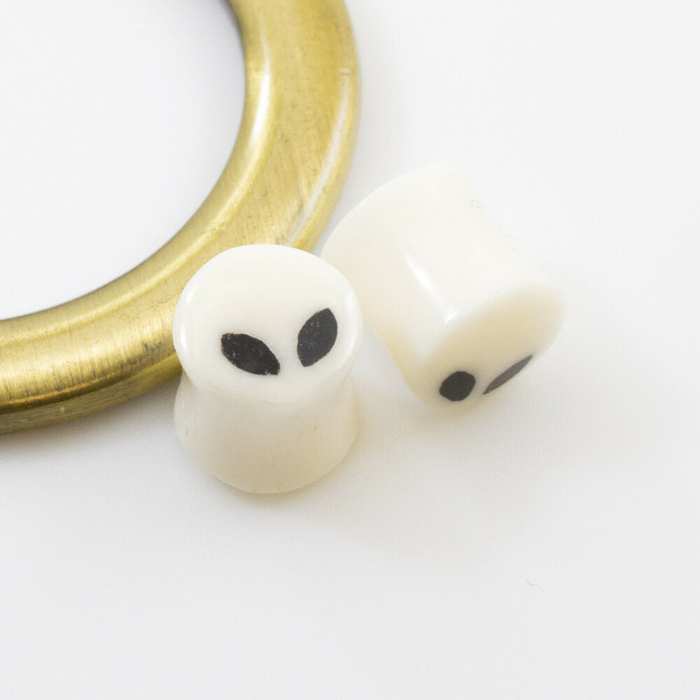 Pair of Ear Plugs made of Organic Horn Bone with Alien Design